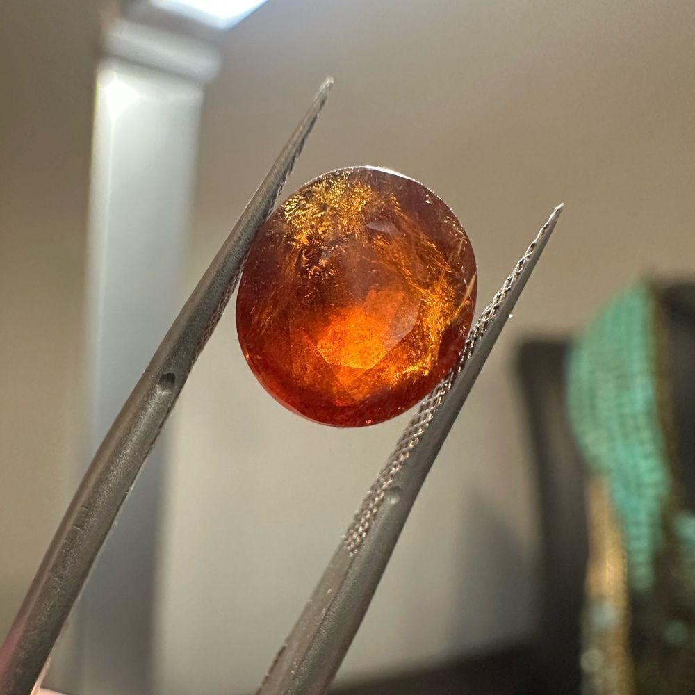 4ct natural, oval cut Spessartite Garnet